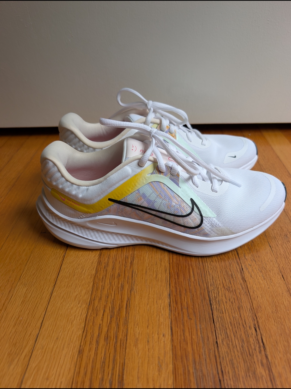 Nike Women's White Running Sneakers with Pastel Accents